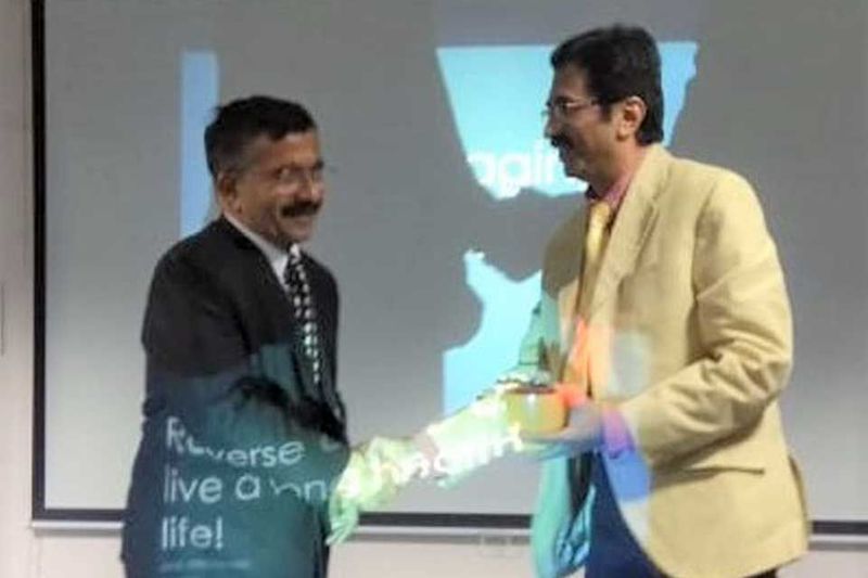 Dr. Singhvi being welcomed at the Ujjain talk